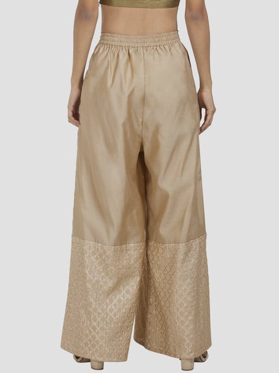 Buy online Gold Solid Palazzo from Skirts, tapered pants & Palazzos for  Women by Wishful By W for ₹780 at 61% off | 2024 Limeroad.com