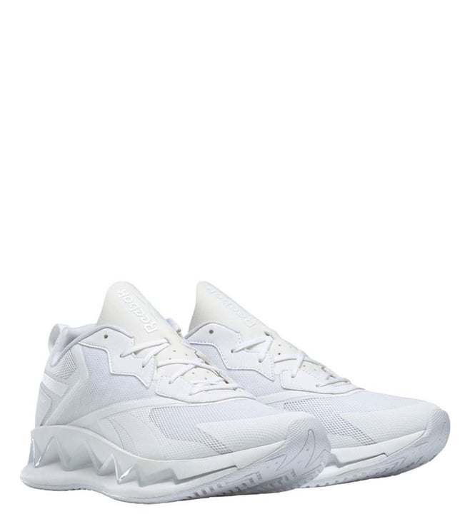 reebok white sports shoes