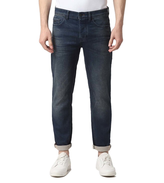 tapered fit mid rise jeans