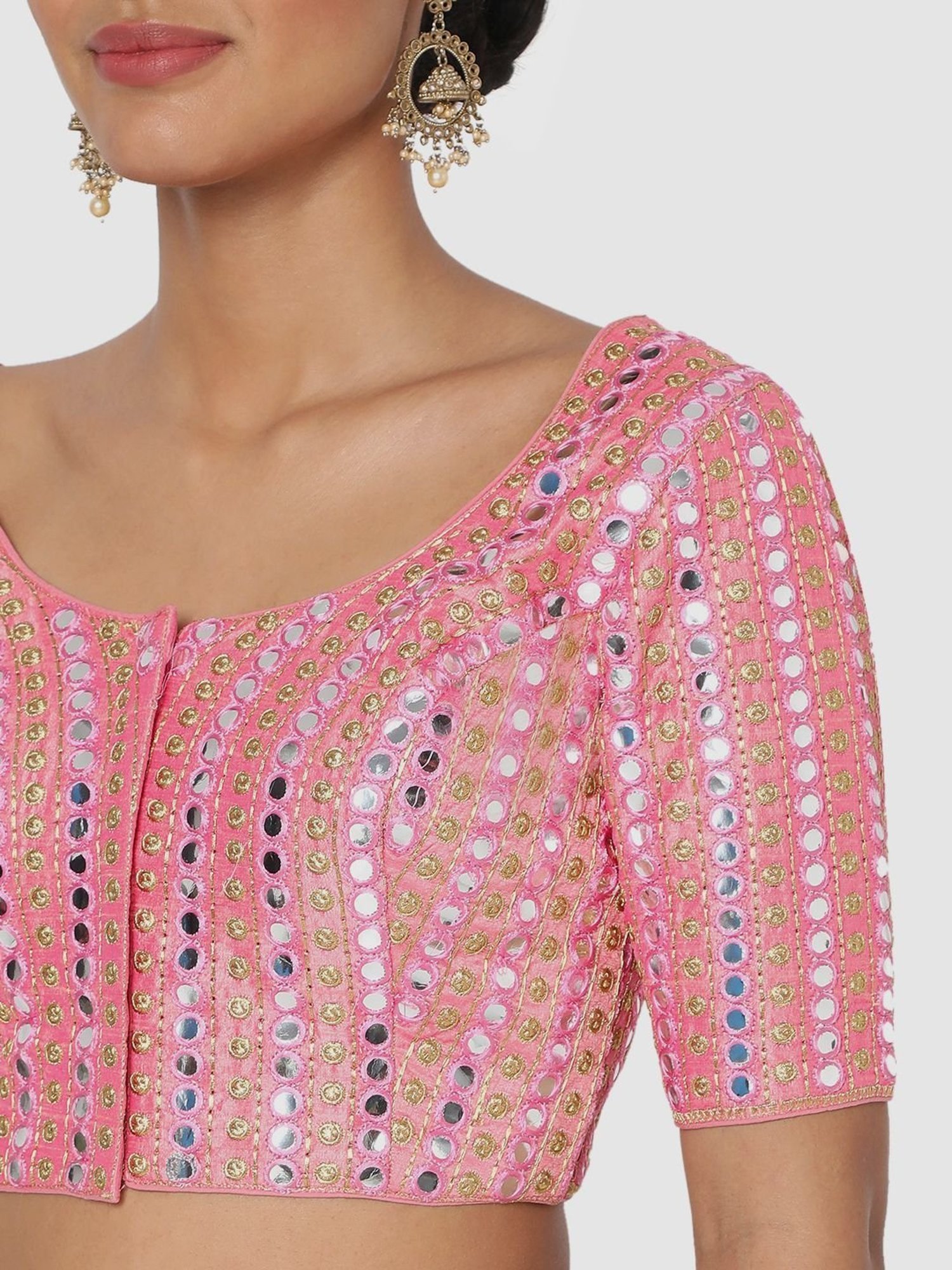 pink blouse with pearls