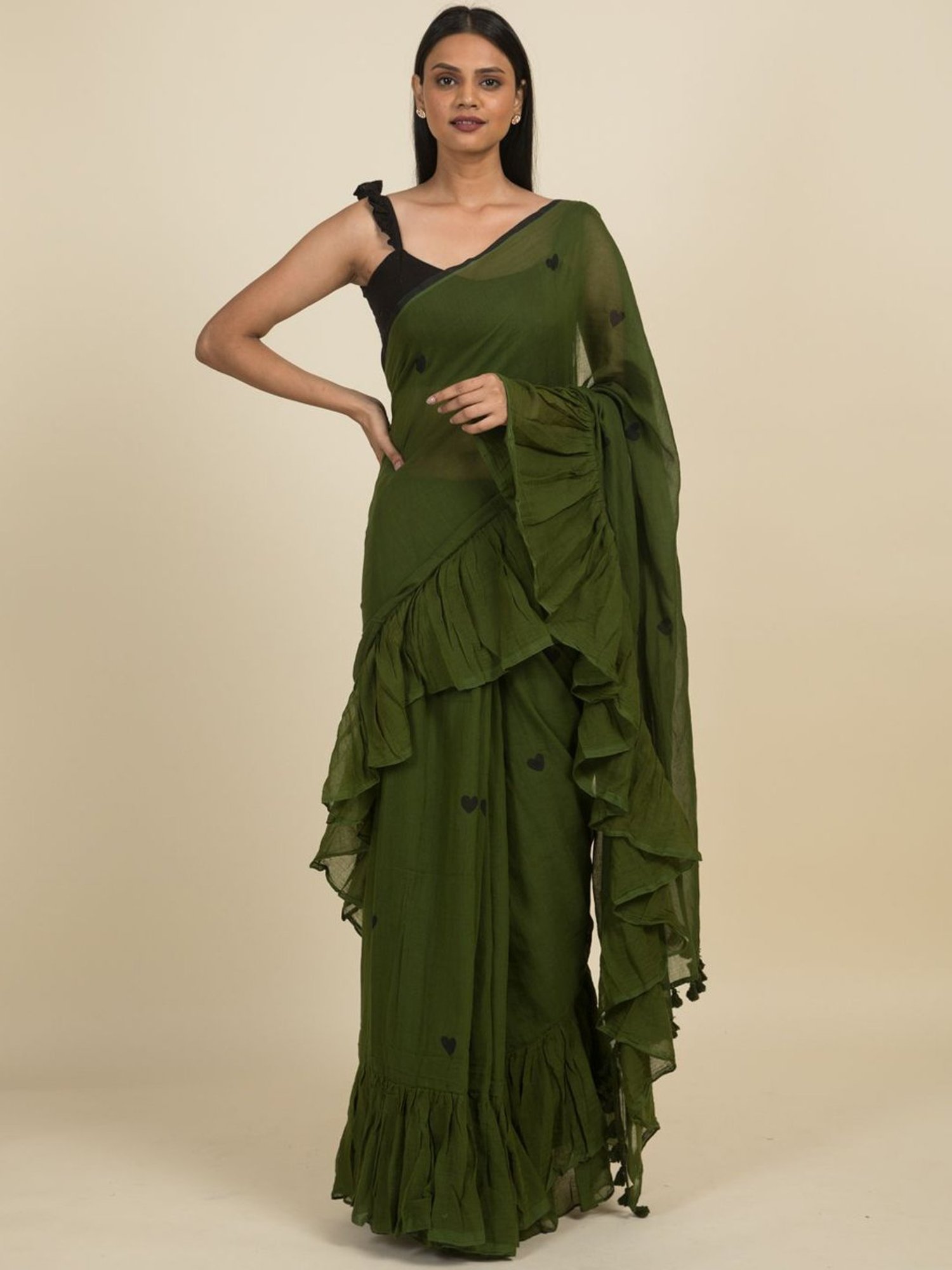 Buy MINT GREEN TIERED RUFFLE SAREE by Designer Sanya Gulati