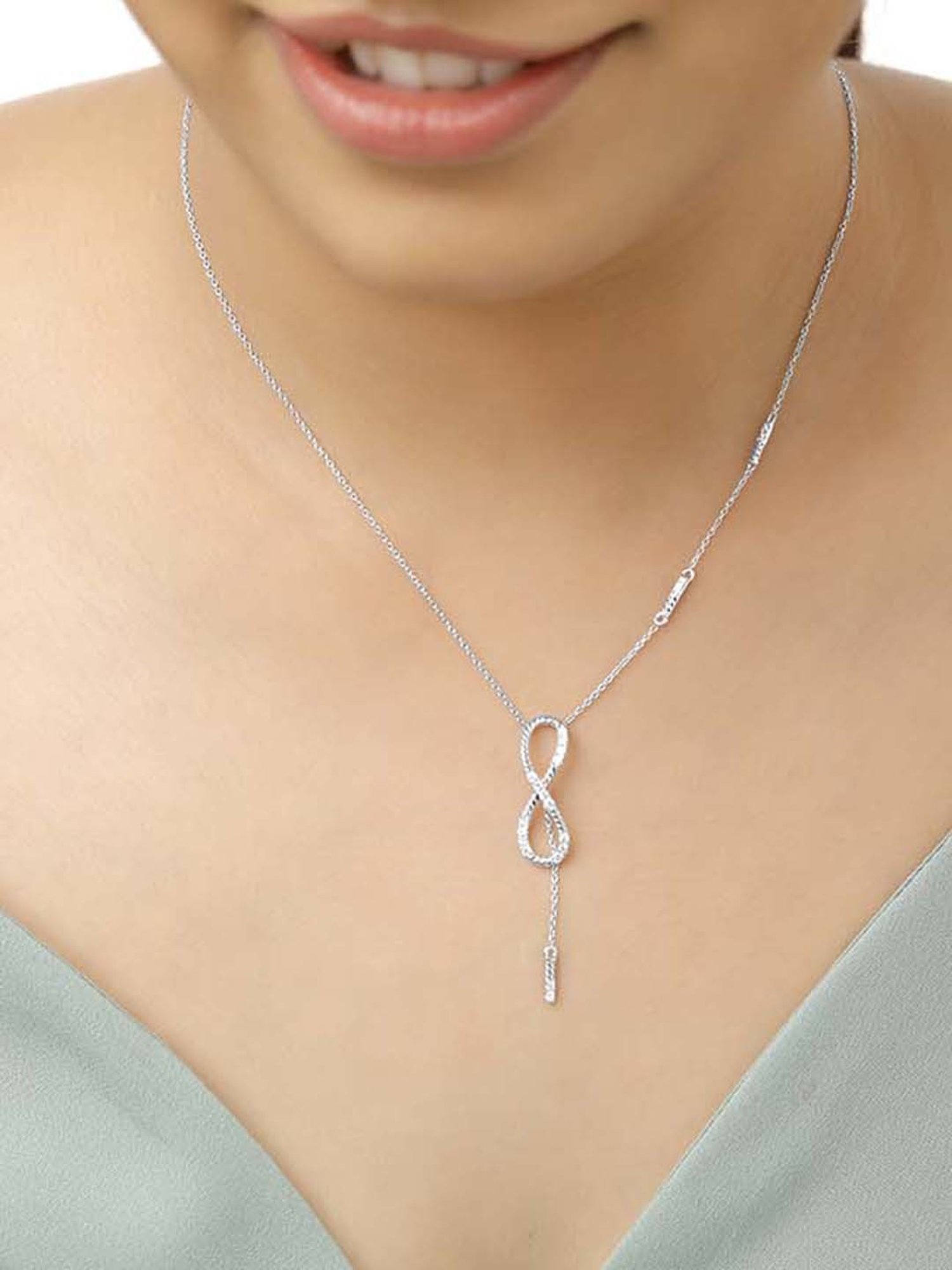 Tanishq clearance infinity pendant