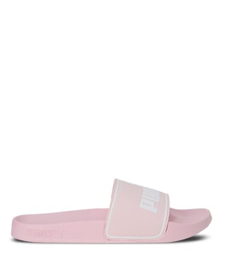 Pink and store white puma slides