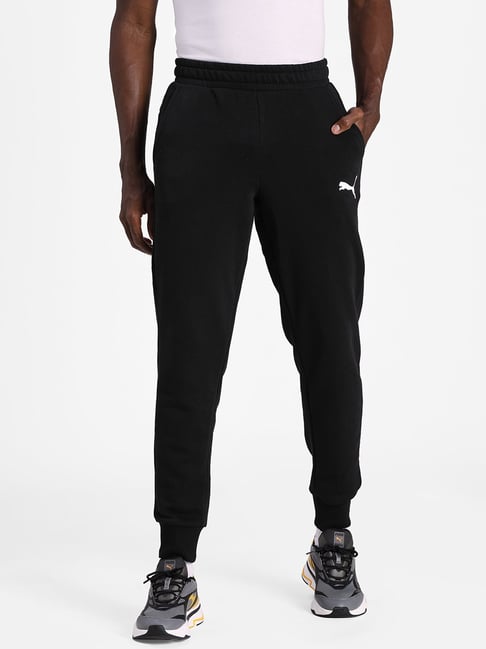 PUMA Tapered Woven Pants Solid Men Black Track Pants  Buy PUMA Tapered  Woven Pants Solid Men Black Track Pants Online at Best Prices in India   Flipkartcom