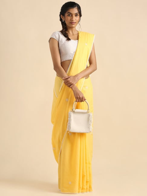 TANEIRA Yellow Embroidered Saree Without Blouse Price in India