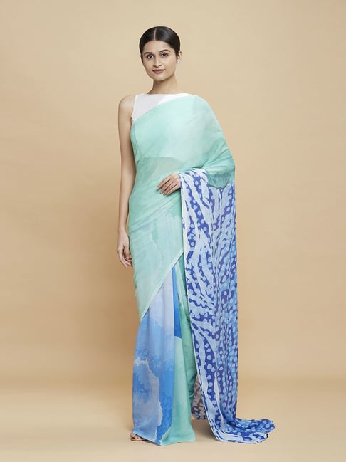 Navyasa Sea Green Liva Georgette Abstract Printed Saree With Coordinated Unstitched Blouse Piece Price in India