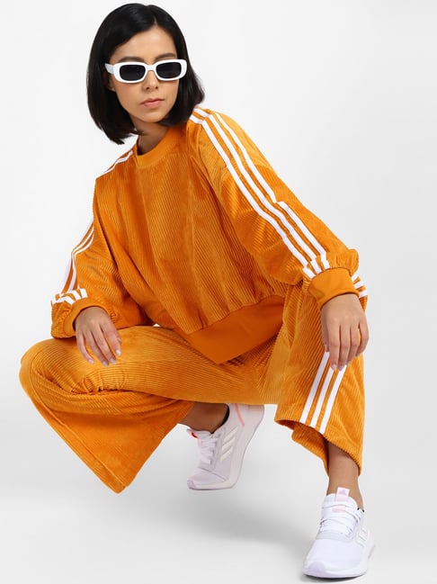 Orange and cheap white adidas pants