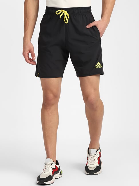 Adidas black shorts on sale with yellow stripes