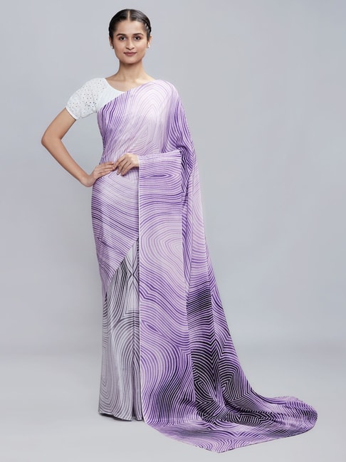 Navyasa By Liva Purple & White Printed Saree Price in India