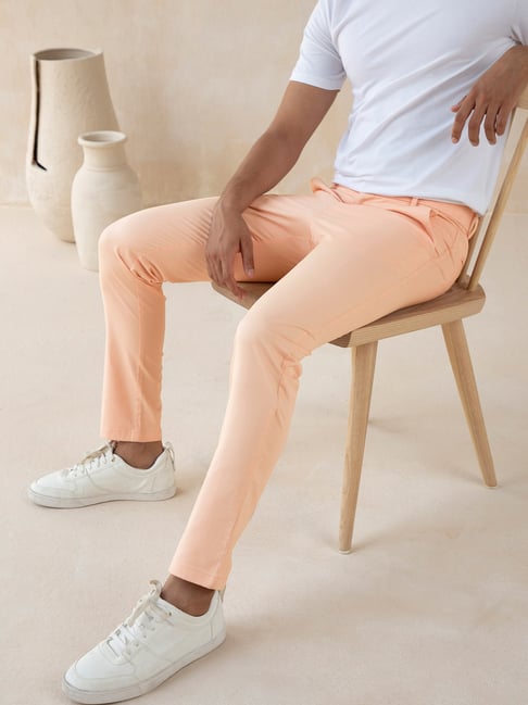 Buy Men PeachColoured SelfDesign Chino Trousers online  Looksgudin