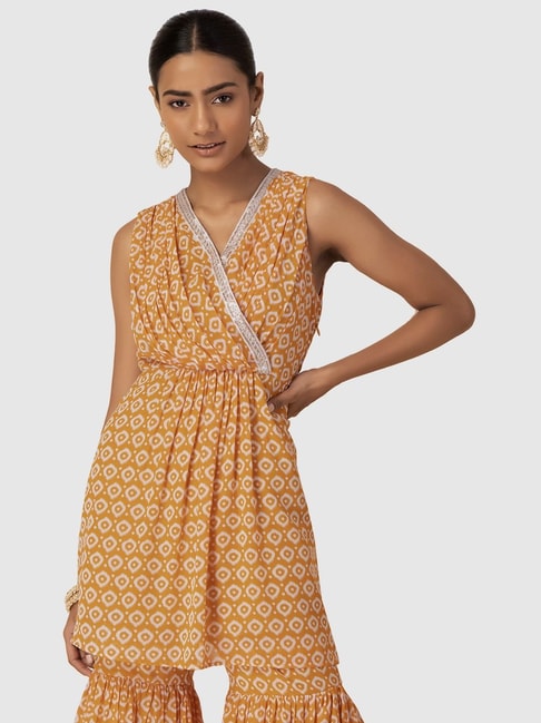Indya Yellow Embellished A Line Kurti Price in India