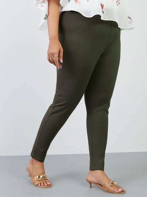 ASOS DESIGN flare pants in crepe with cut out side detail in black | ASOS