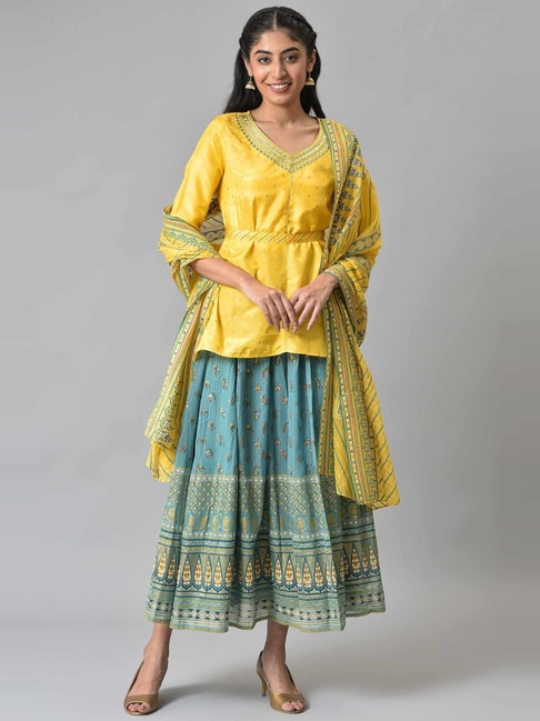 Peach short kurta with beige skirt  set of two by Anecdotes  The Secret  Label