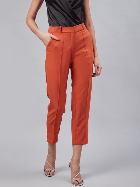 Radio WHAT - from @victoriabeckham - My favourite #VBPreSS19 look - red  tailored wide leg trousers and the light blue gathered sheer top. Now  available on my website and at #VBDoverSt! x