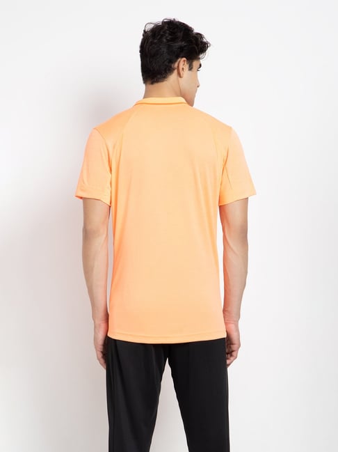 Adidas orange outlet polo shirt