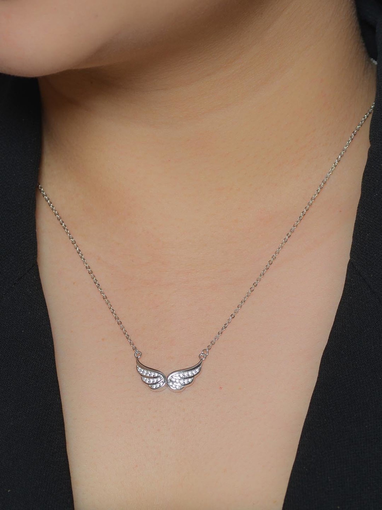 Sheltering Wings necklace: silver double-wing pendant on rope chain | Felt