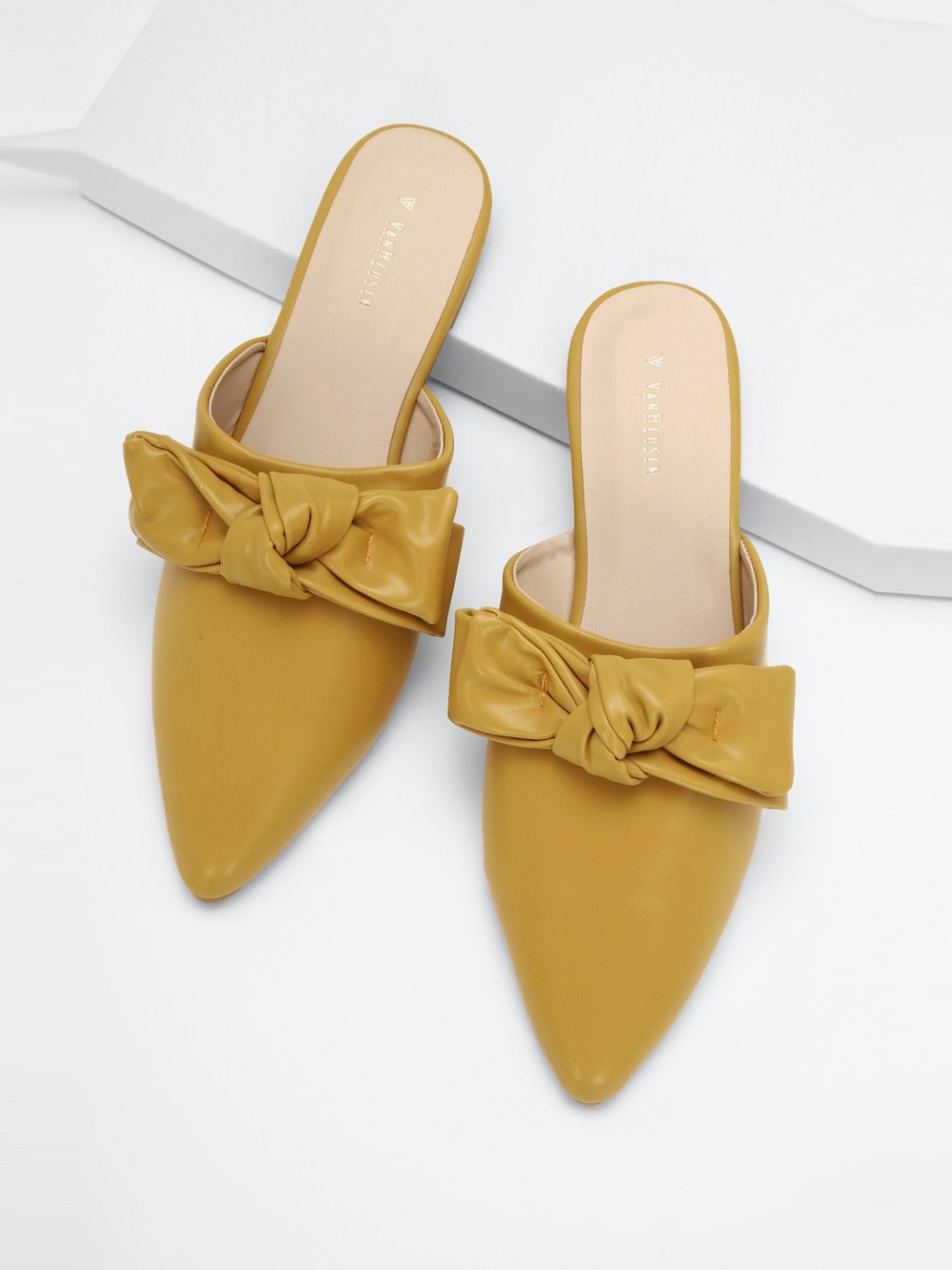 Yellow flat store mules