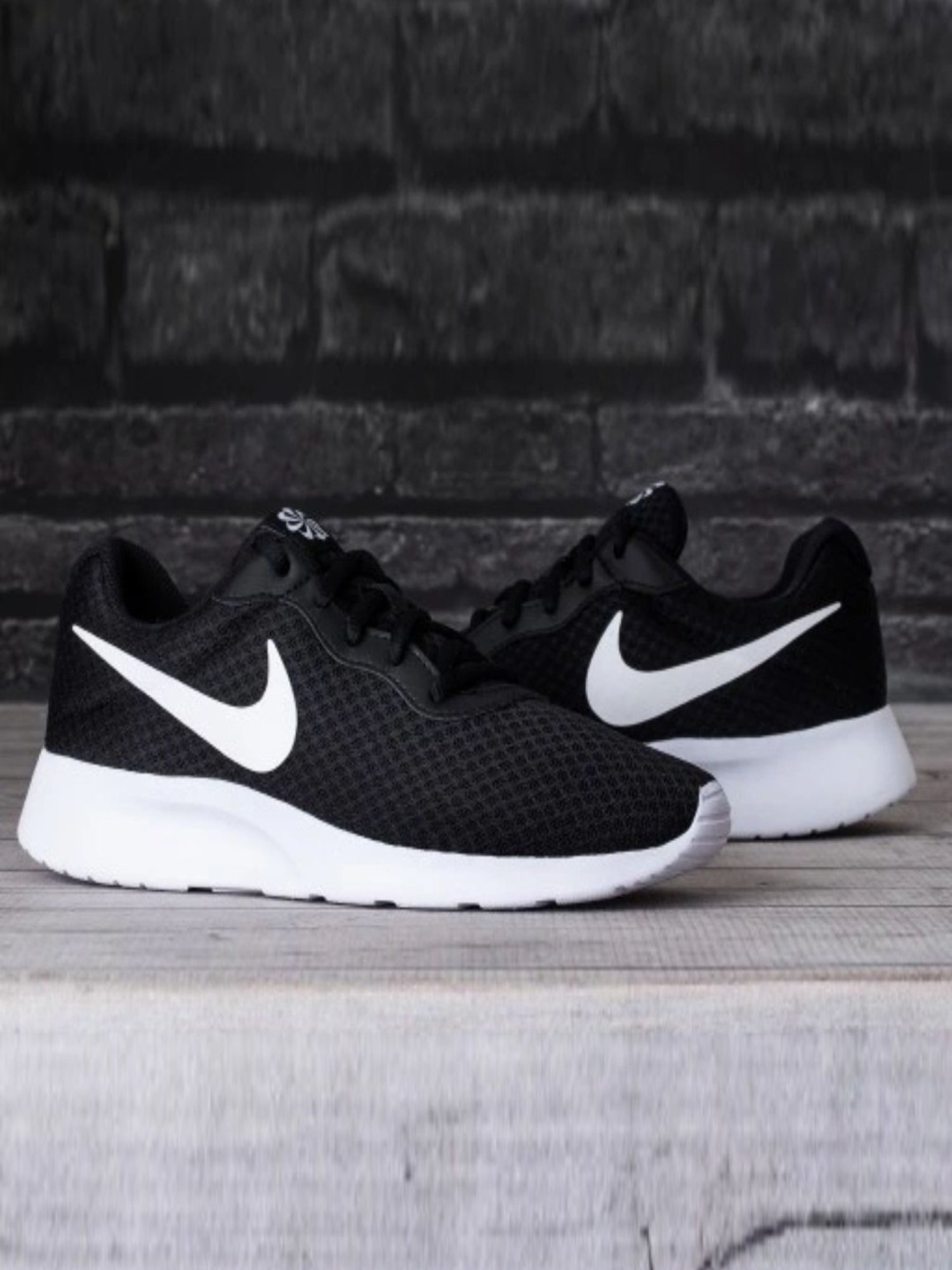 tanjun black and white