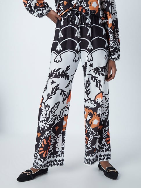 Wardrobe by Westside Orange And White Garden Print Trousers