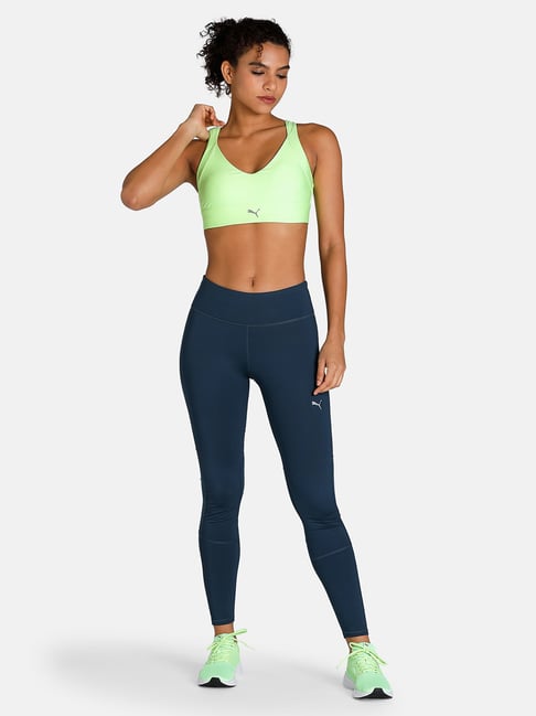 PUMA Running Evolve medium support sports bra in light green