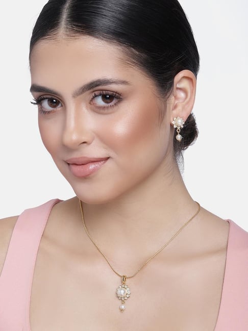 Buy Gold Plated Kundan Embellished Pendant Necklace by Mero Jewellery  Online at Aza Fashions.